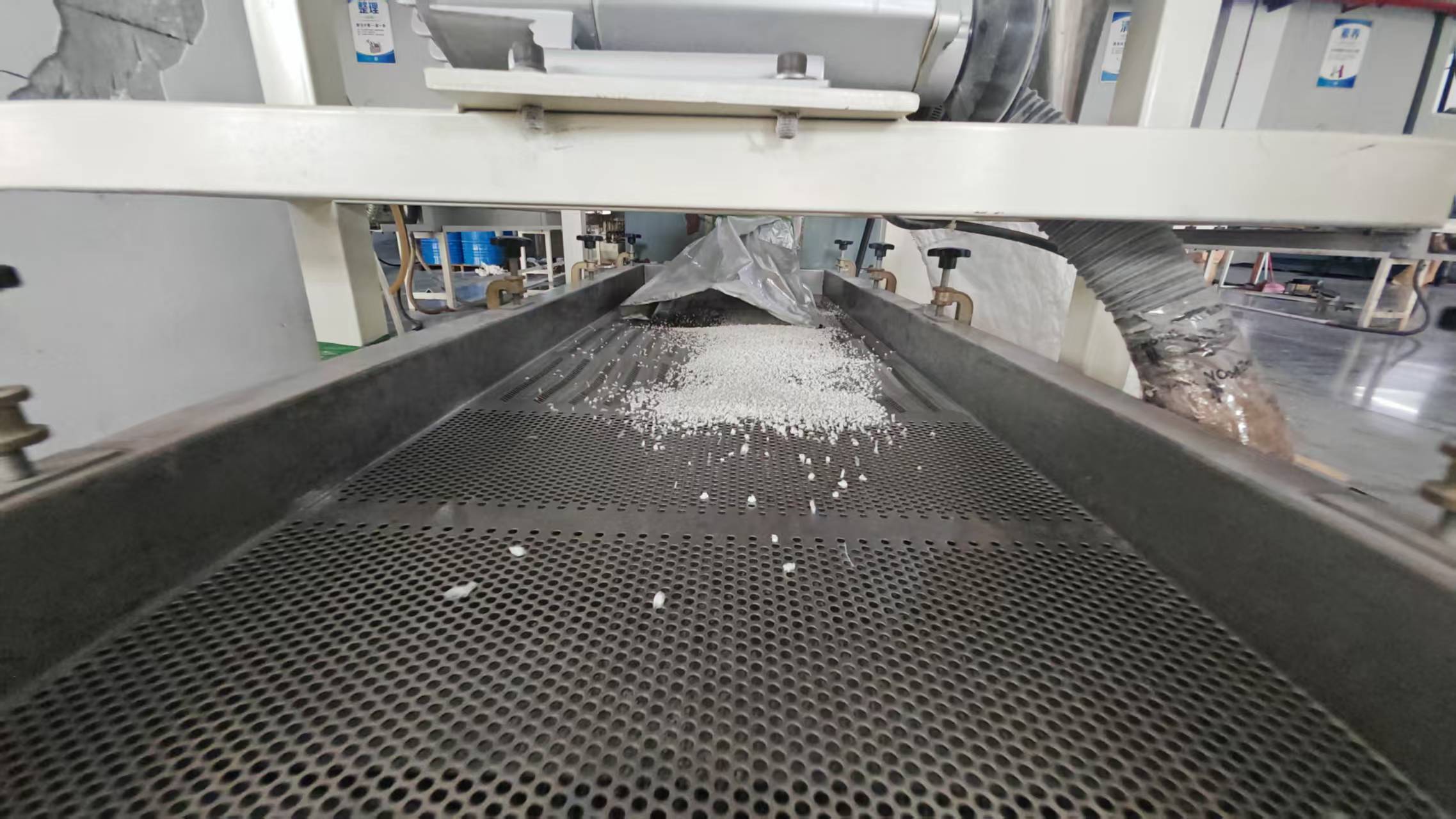 Pelletizing stage in WanHan modified engineering-plastic compound production.