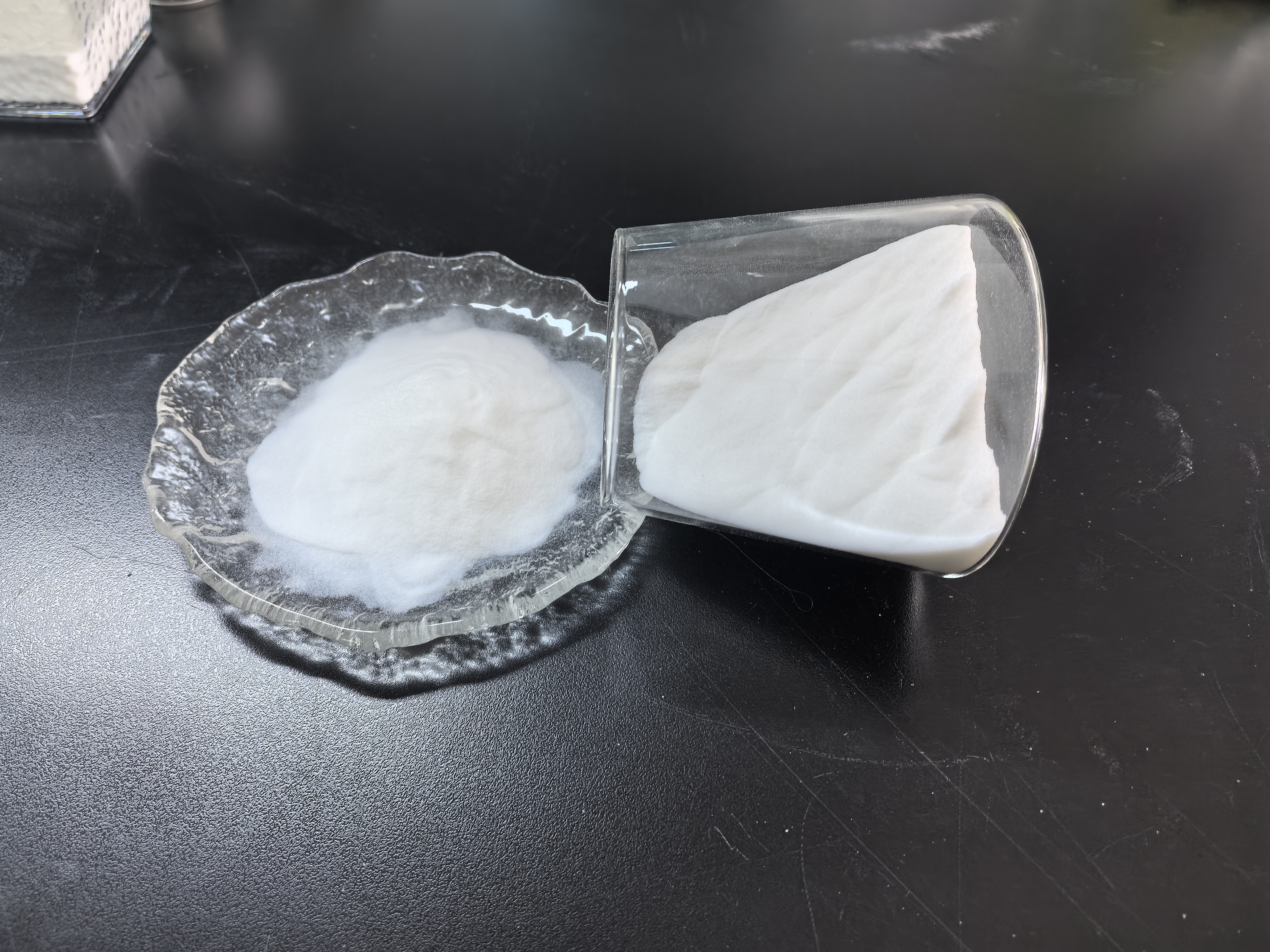Food-grade silicon dioxide powder shown as a bulk industrial material