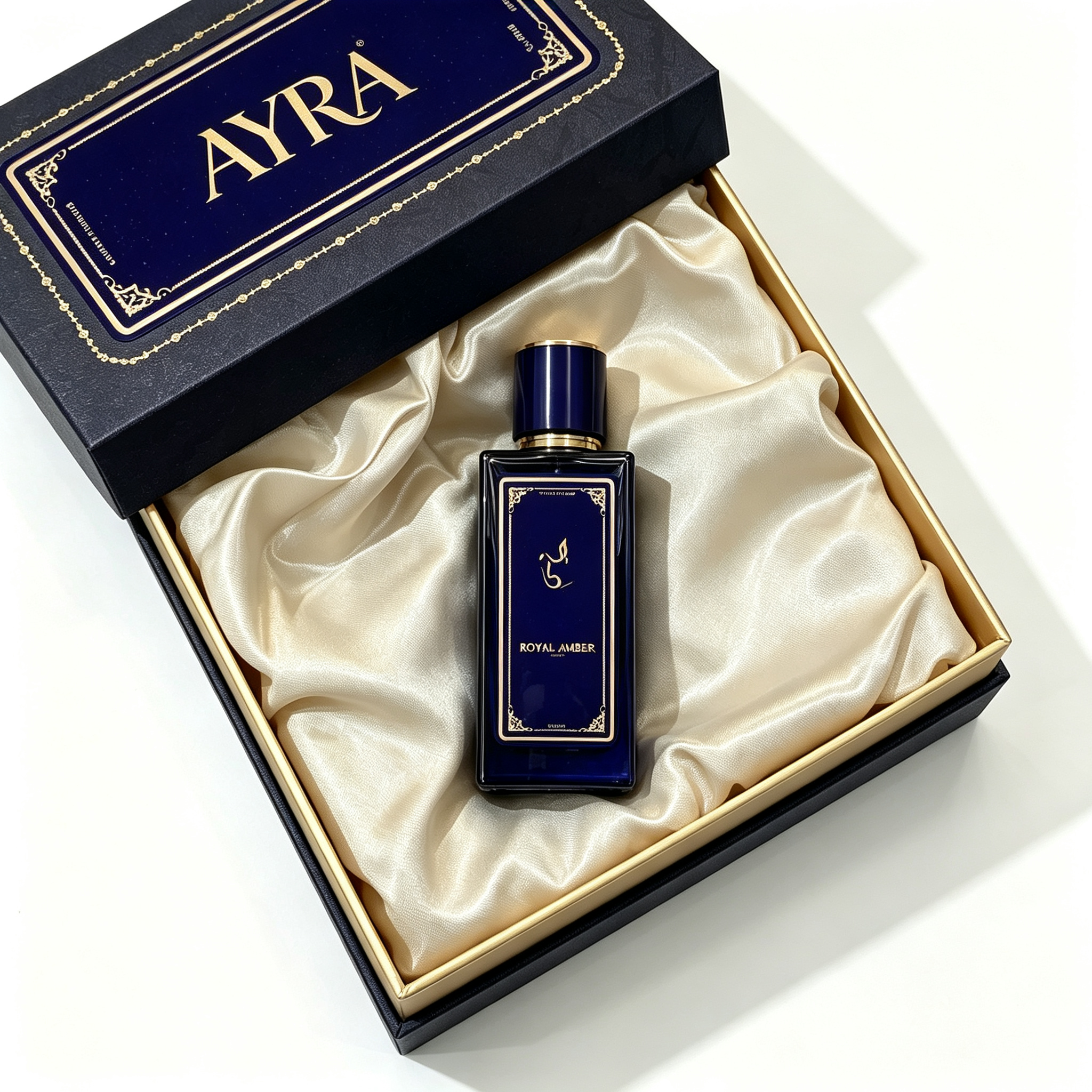 High-end two-piece rigid perfume box in deep navy blue. The lid features hot-stamped vintage patterns, with champagne silk lining inside to hold the perfume bottle. Luxurious and elegant for premium perfume gift sets.