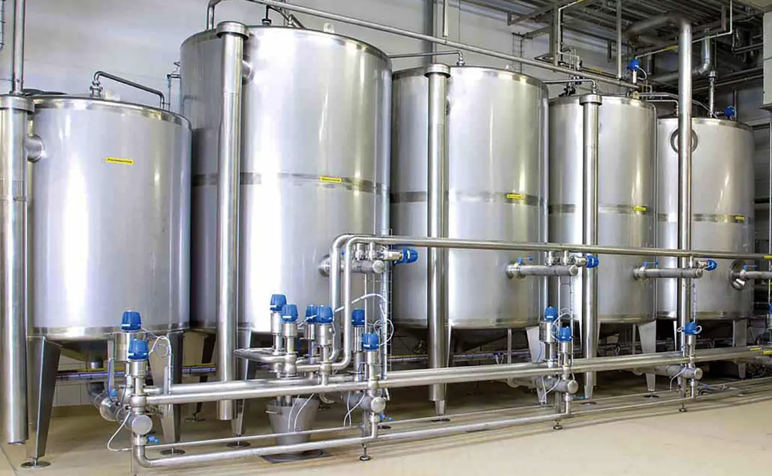 Liquid additive storage tank at a fertilizer additive production facility