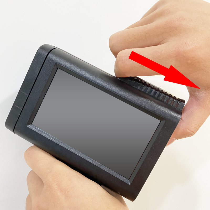 M10 handheld TIJ inkjet printer with the transparent protective cover opened before cartridge insertion