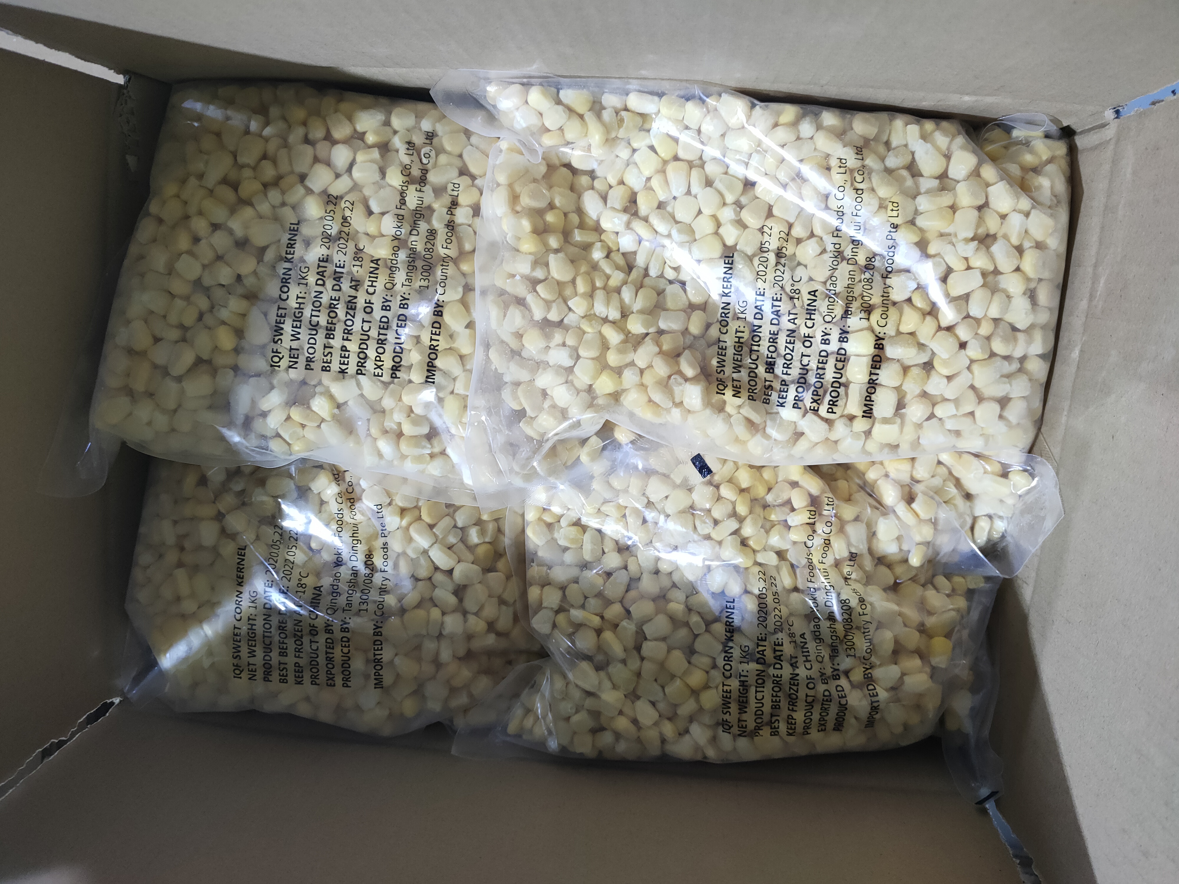 Frozen corn kernels in boxes