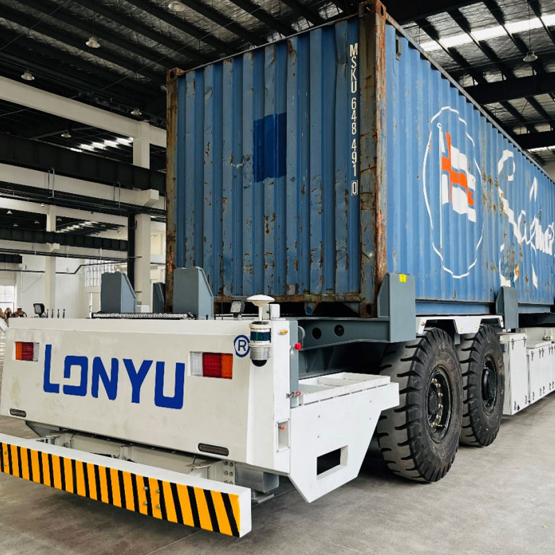 Outdoor heavy duty AGV platform for yard and cross-workshop transport Outdoor heavy duty automated guided vehicle platform configured for yard and inter-workshop transport of oversized industrial components